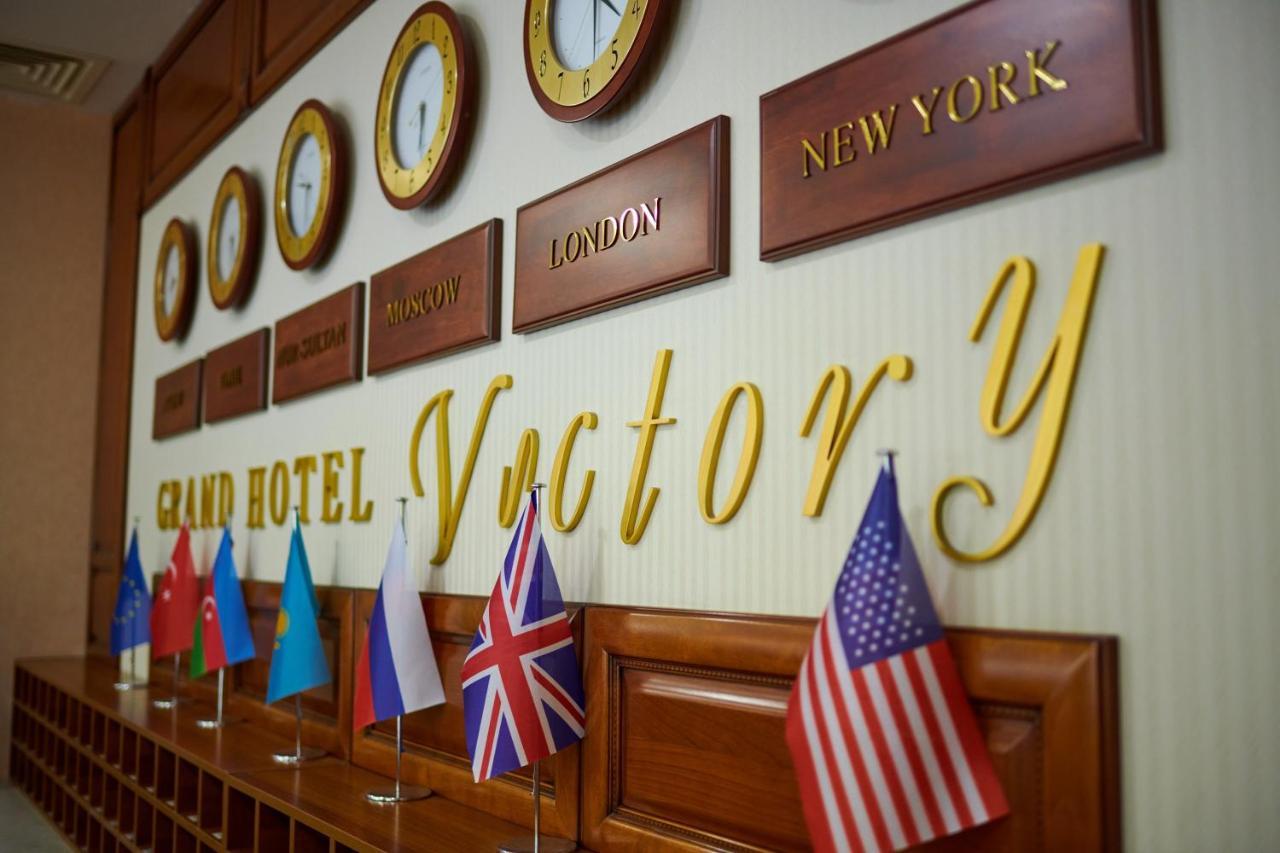 אקטאו Grand Hotel Victory מראה חיצוני תמונה The hotel's lobby